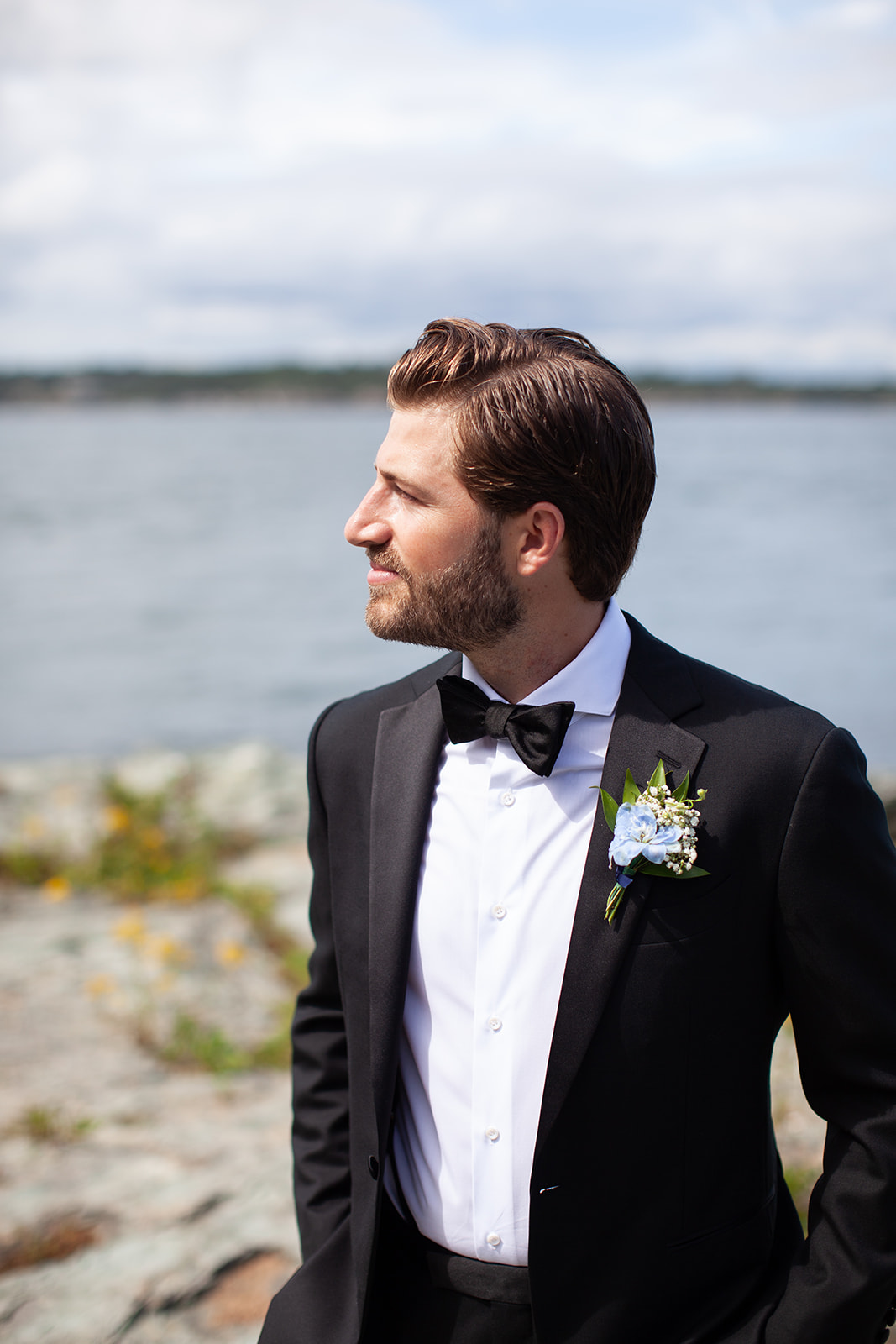 Groom portrait on the waterfront